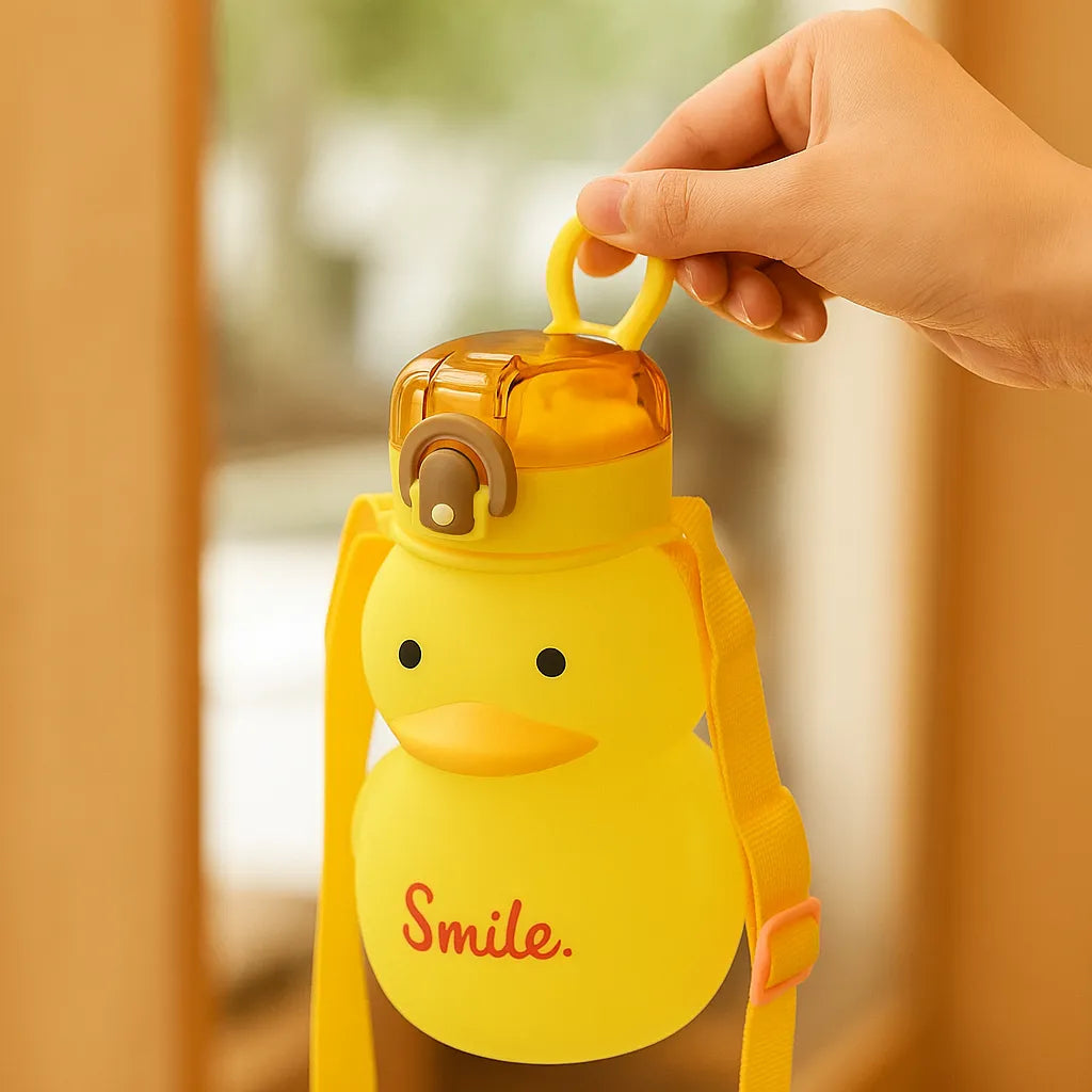 gourde enfant canard jaune transport main